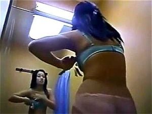Fascinating Asian babe trying out new bra in changing room