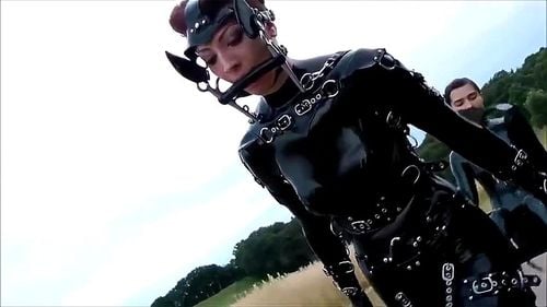 Latex ponygirl outside