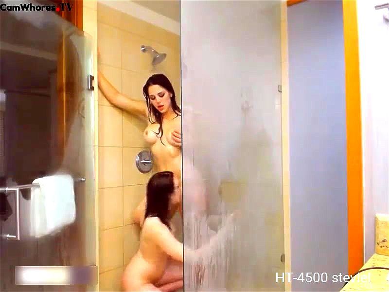 Two hot girl play in the shower