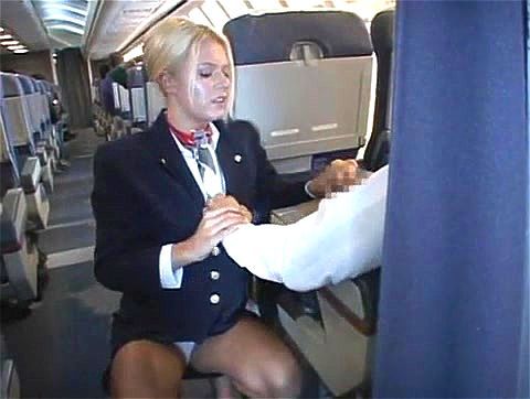Air hostess sucking on the plane