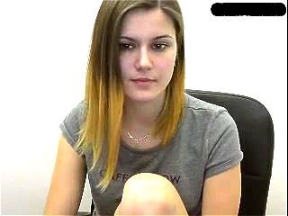 Cute teen Levella in front of her webcam